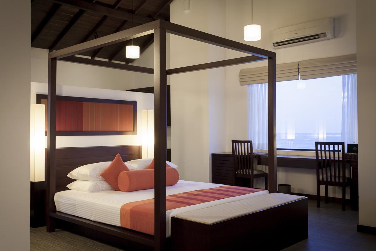 The Calm Resort & Spa Passikudah Quarto foto